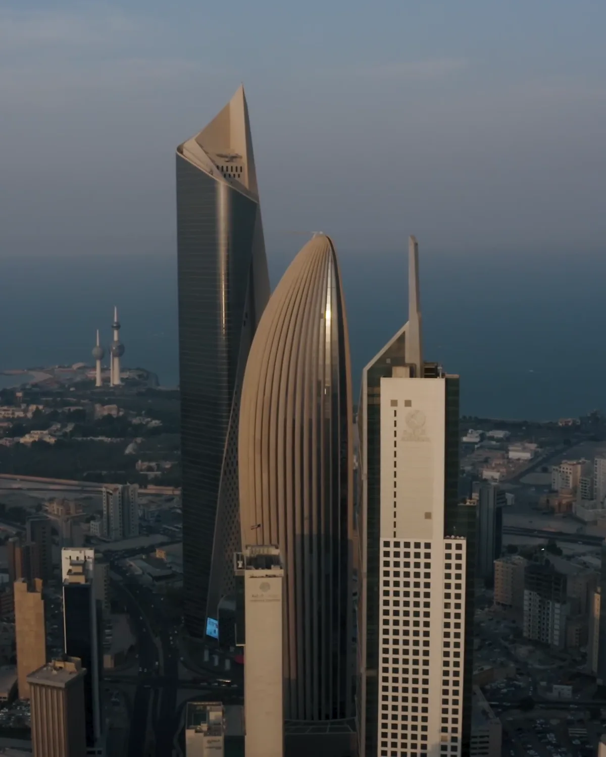Kuwait City skyline, with the Kuwait Towers on the waterfront behind
